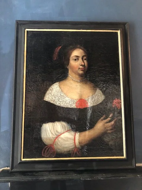 Aristocratic lady holding a posy